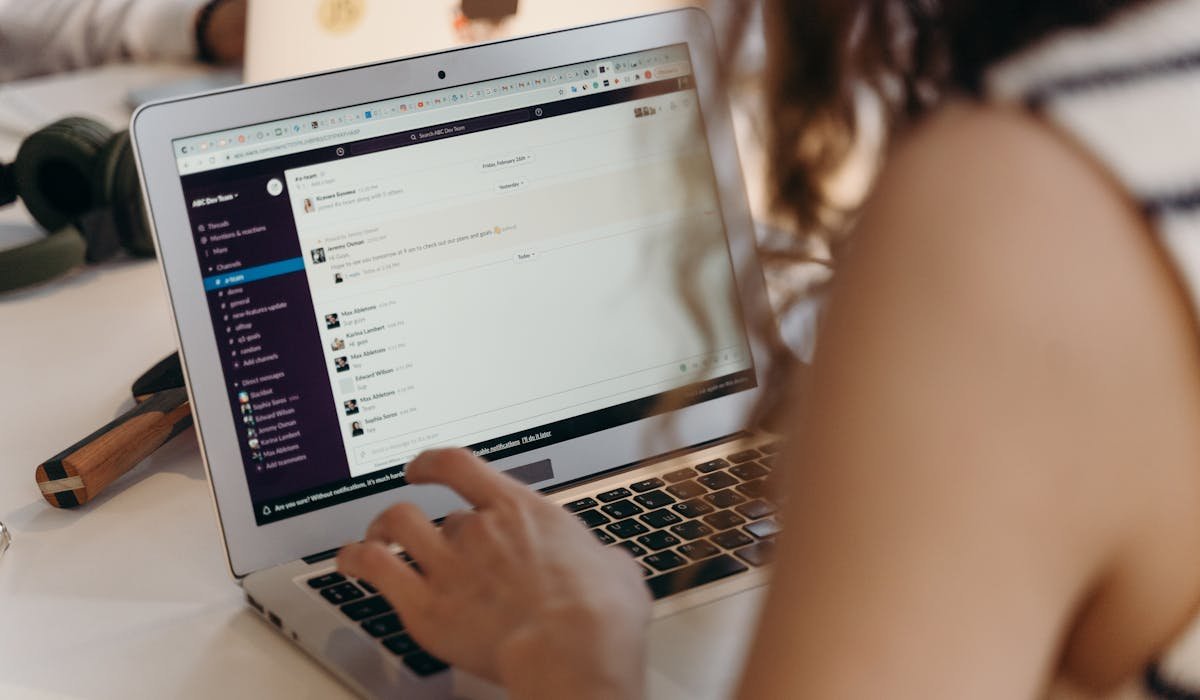 Laptop showing email inbox with AI assistant - best AI email assistants 2026