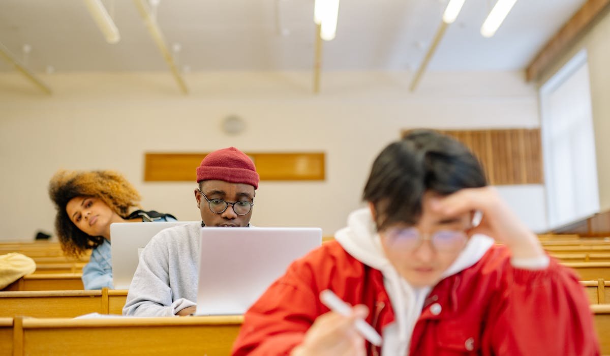 Student studying with laptop and AI tools - best AI tools for students 2026