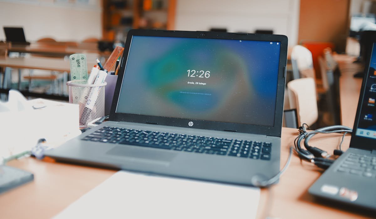 Chromebook on desk with apps open - best Chromebook apps 2026