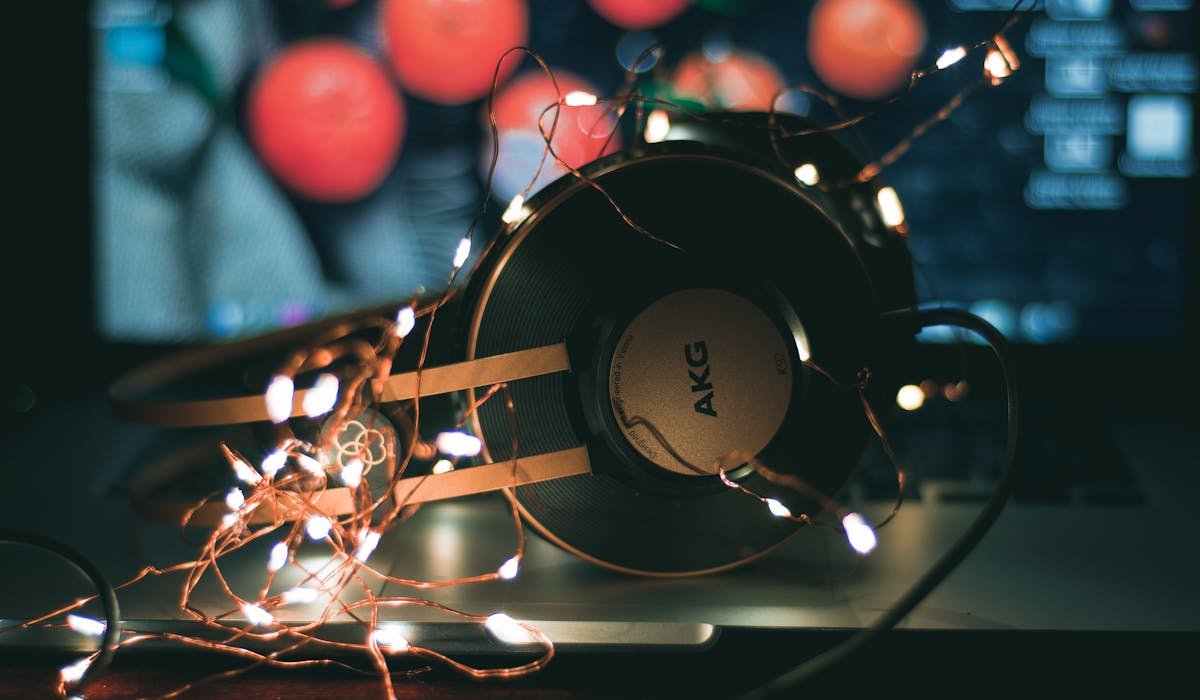 Laptop with music download interface - best free music downloaders 2026