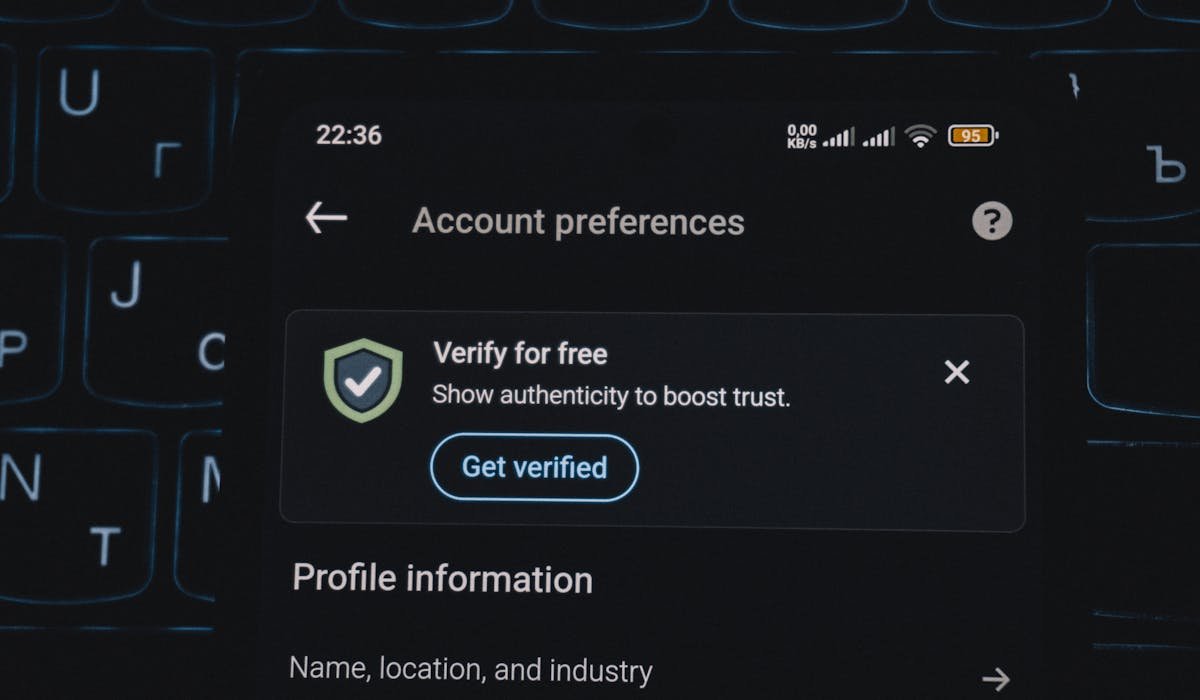 Phone showing 2FA code - best free password managers with two-factor support