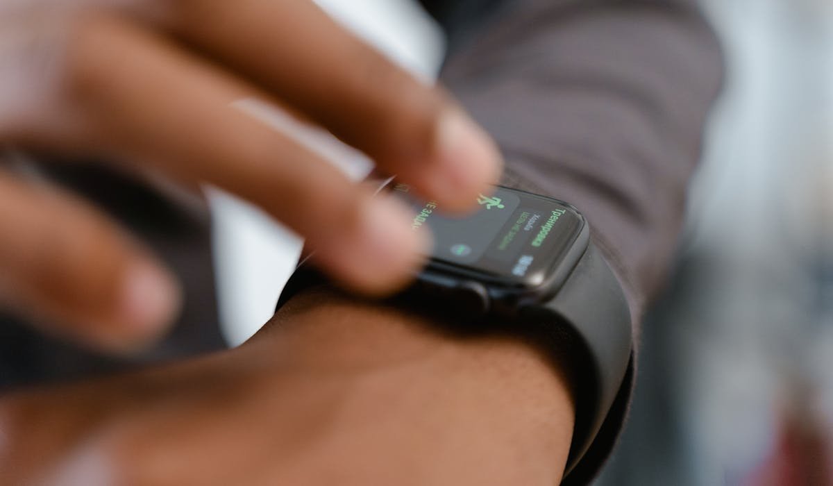 Smartwatch on wrist showing fitness stats - best smartwatches under $200