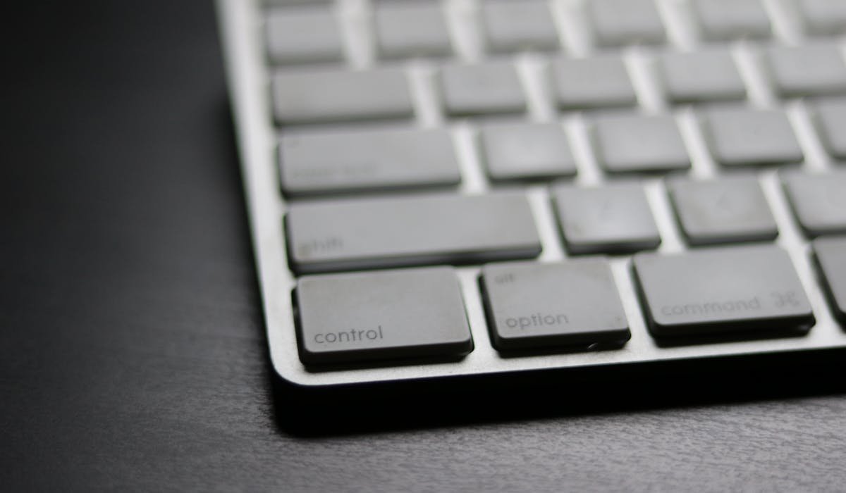 Mac with wireless keyboard on desk - best wireless keyboards for Mac 2026