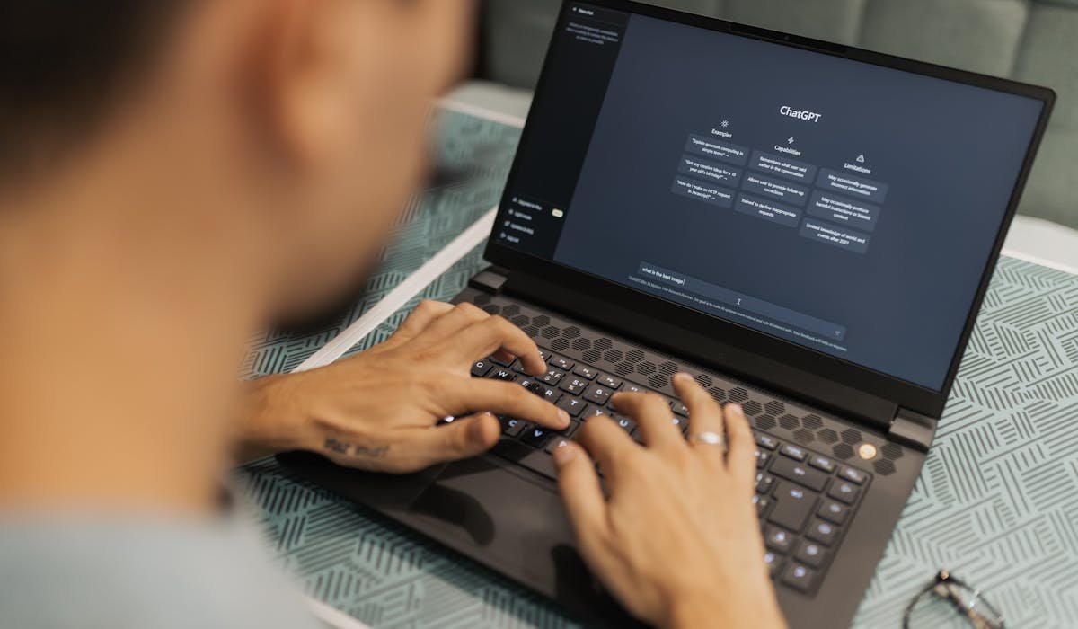 Laptop with AI chatbot interface - ChatGPT vs Gemini vs Claude comparison