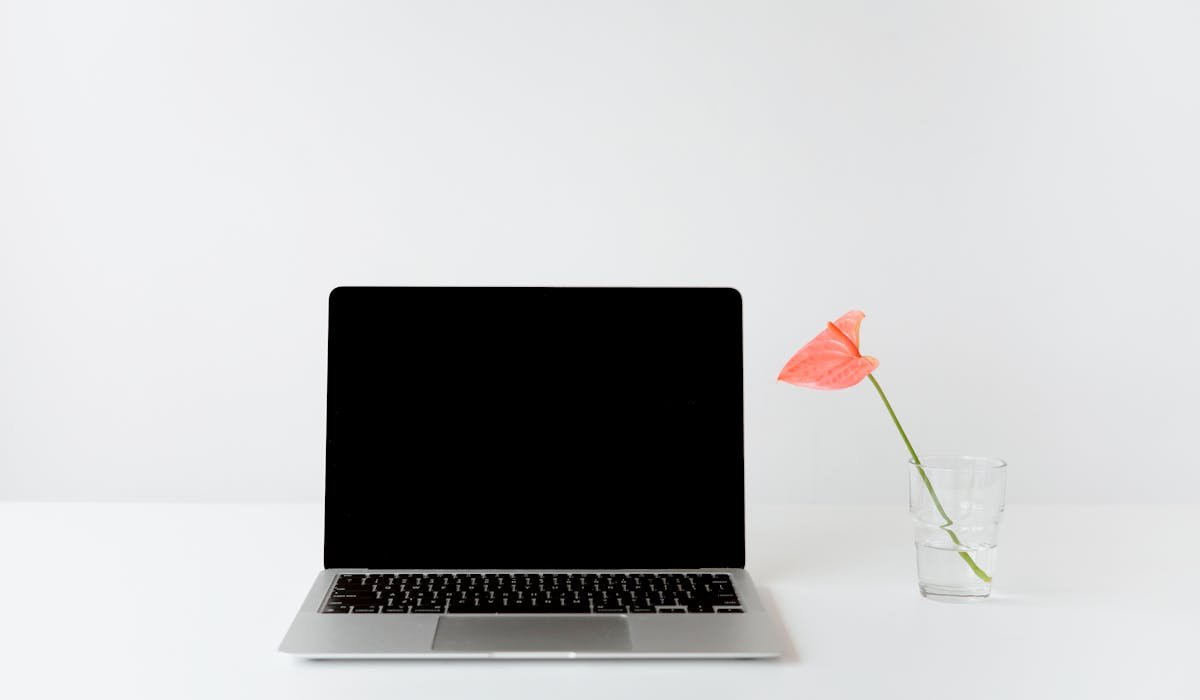 Chromebook on table with screen on - how to fix glitching Chromebook screen issues