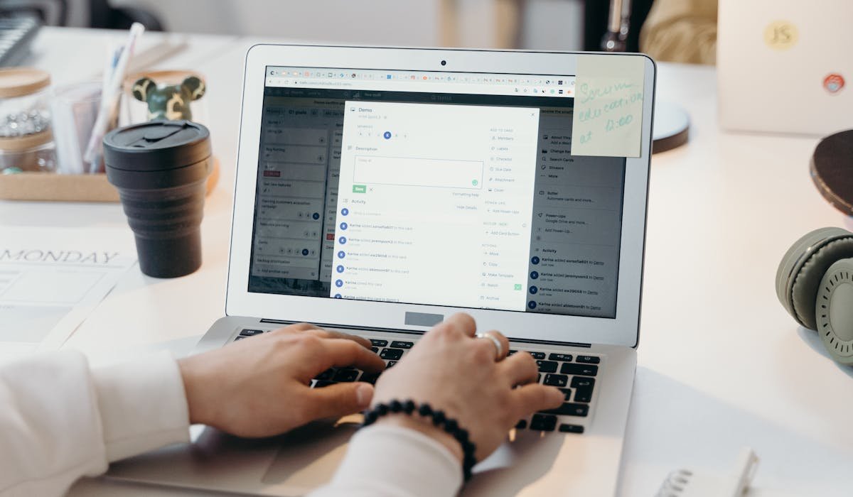 Laptop showing email inbox - how to recover deleted emails in Outlook